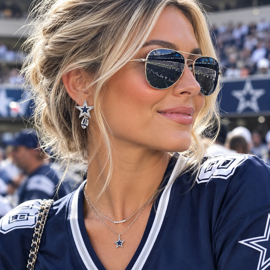 Dallas Cowboys crystal star and football drop earrings pair on white background, silver and navy